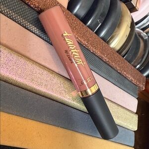 Tarte Lip Paint in Black and Orange Packaging